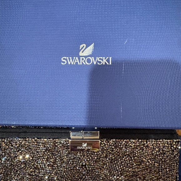 Swarovski Crystal-Embellished Black and Silver Clutch
New in original box - Picture 3 of 5